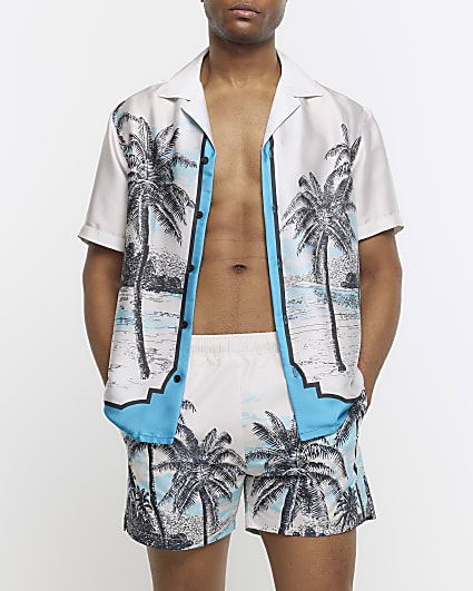 Blue regular fit palm print swim shorts