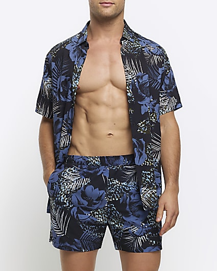 Blue regular fit botanical print shorts