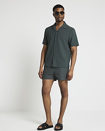 Green regular fit seersucker swim shorts