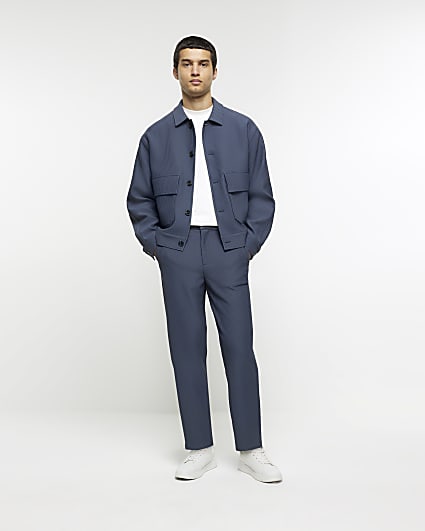 Blue tapered fit plisse smart trousers