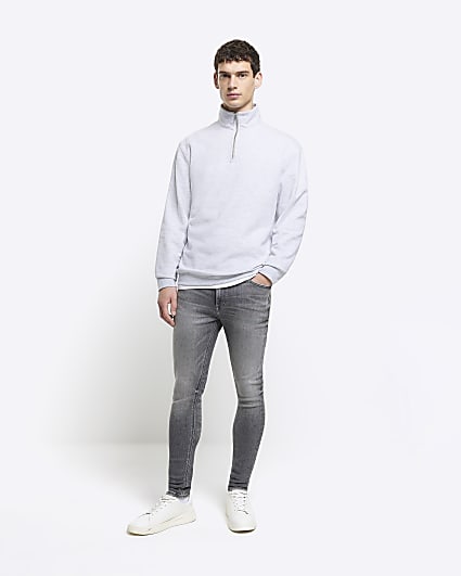 Grey super skinny spray on faded jeans