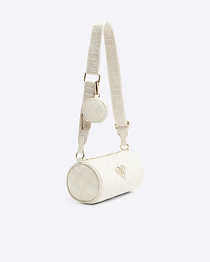 Girls cream RI embossed barrel cross body bag