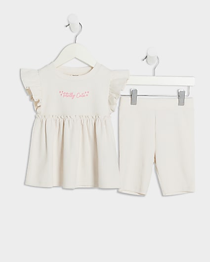 Mini girl cream ribbed peplum shorts set