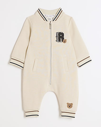 Baby cream embroidered sleepsuit