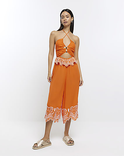 Orange halter neck cut out jumpsuit