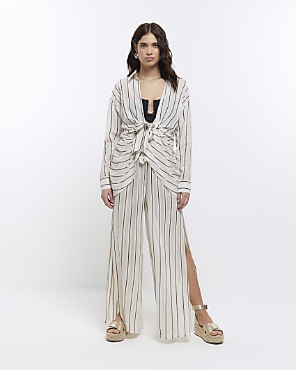 Beige sheer stripe split hem trousers