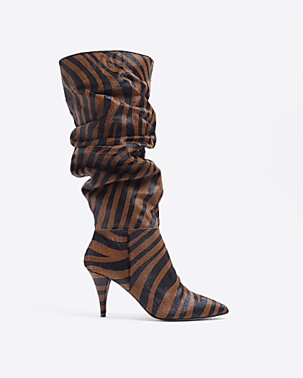 Brown animal print suede knee high boots