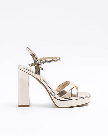 Rose gold crossed strap heeled sandals