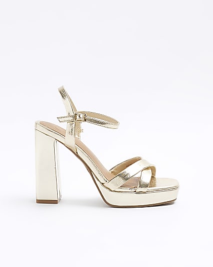 Gold crossed strap heeled sandals