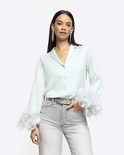 Green feather cuff shirt