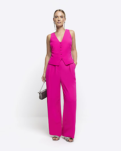 Pink pleated wide leg trousers