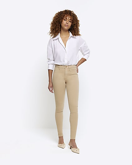 Cream mid rise bum sculpt jeggings