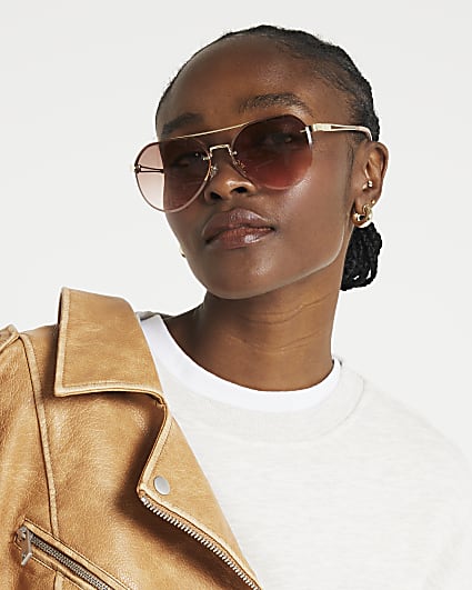 Gold rimless aviator sunglasses