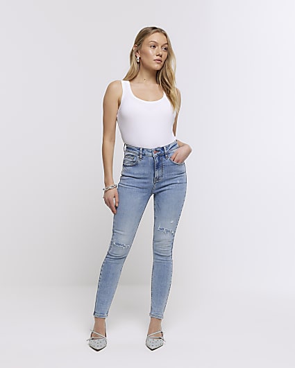 Petite blue high waisted ripped jeggings