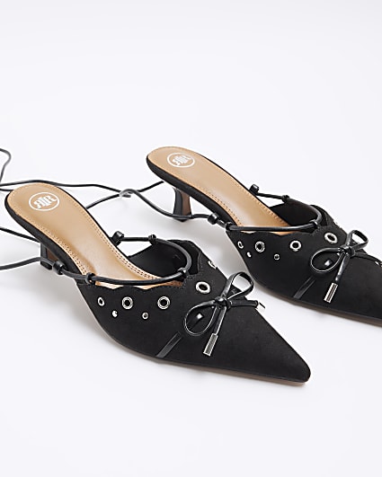 Black eyelets lace up heeled court shoes