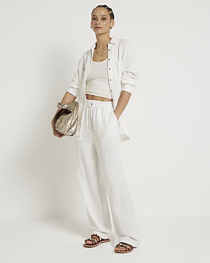 White textured wide leg trousers