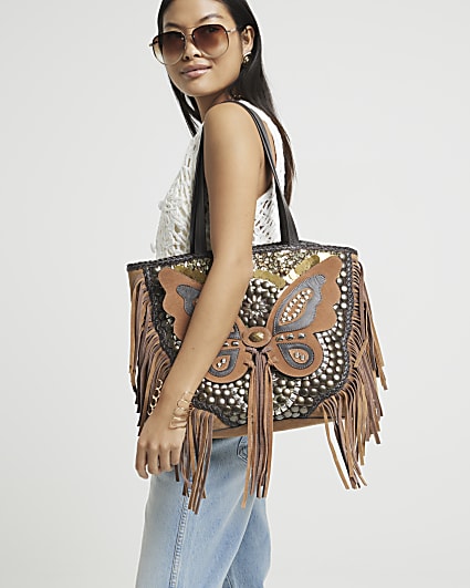 Brown leather butterfly studded tote bag