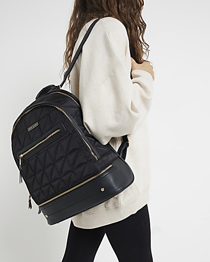 Black quilted zip backpack