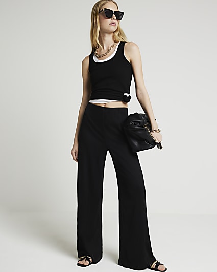 Black ribbed wide leg trousers