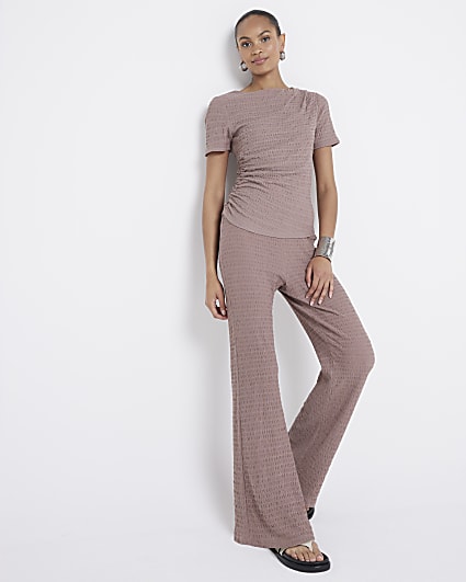 Brown textured flared trousers