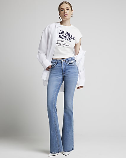 Blue mid rise flared jeans