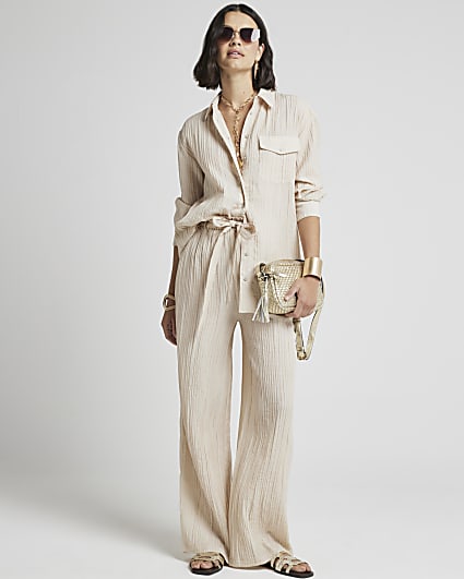 Beige textured wide leg trousers