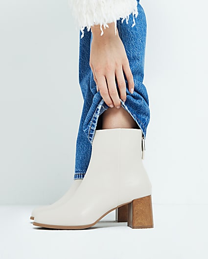 Cream block heeled ankle boots