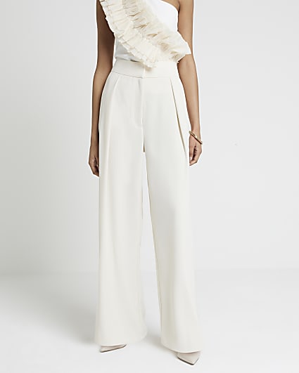 Cream pleated wide leg trousers