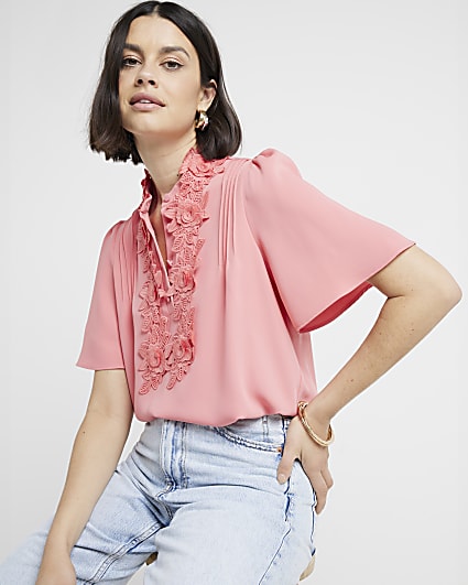 Coral embroidered floral blouse