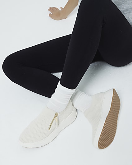 Beige knit wedge trainers