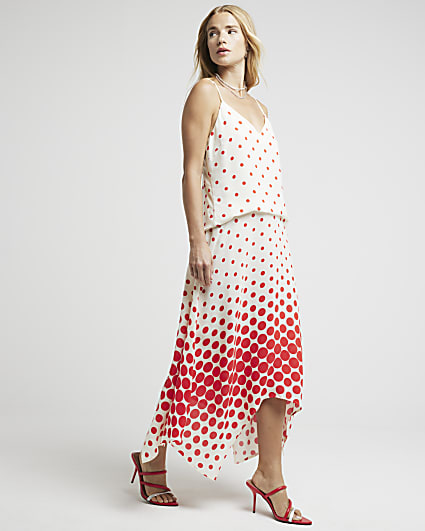 Red spot asymmetric midi skirt