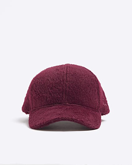 Red fluffy textured cap