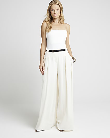 Cream pleated wide leg trousers