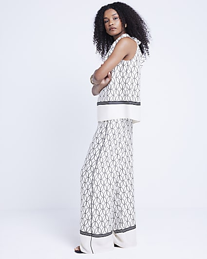 White geometric wide leg trousers