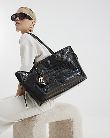 Black embossed RI monogram shopper bag