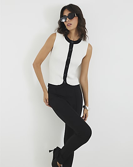 White Sleeveless Curved Hem Ribbed Top