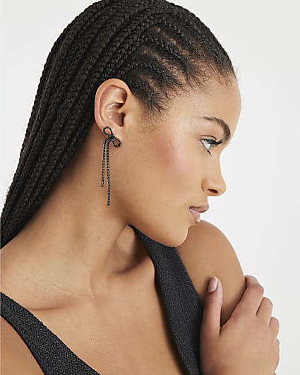 Black diamante bow drop earrings