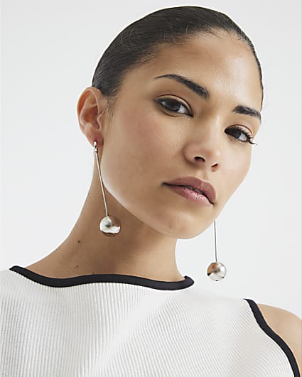 Silver long ball drop earrings