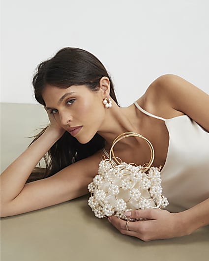 Cream Pearl Metal Ring Handle Clutch Bag