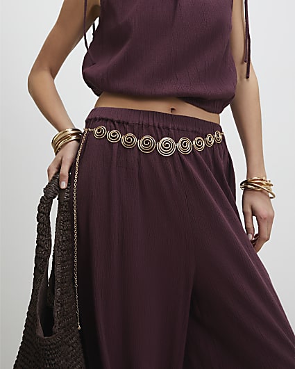 Gold swirl chain belt