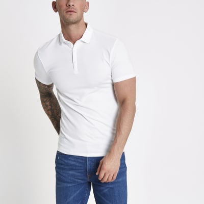 white polo shirt and jeans