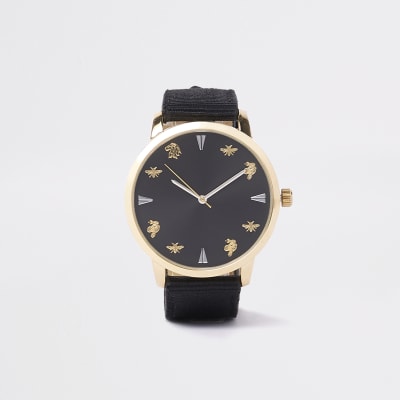 Armbanduhr in Schwarz und Gold