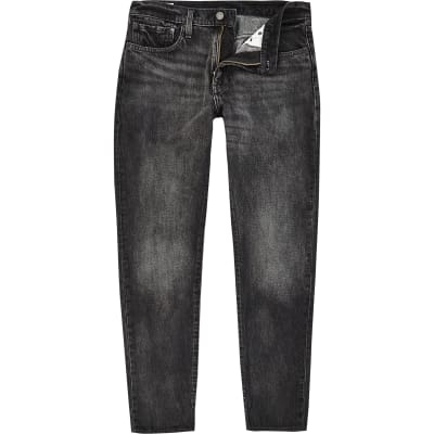 Levi’s black denim 512 slim taper fit jeans | River Island