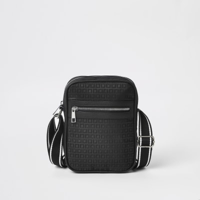 Black RI monogram cross body flight bag River Island