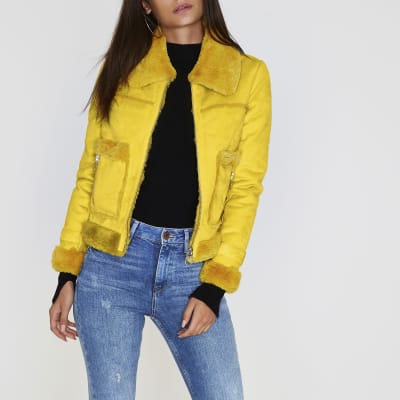 Yellow faux shearling trucker jacket Jackets Coats & Jackets women