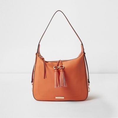 orange tassel bag