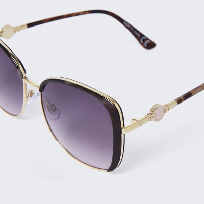 Brown tortoiseshell metal trim sunglasses