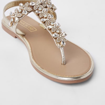 Sandales en cuir dorées ornées