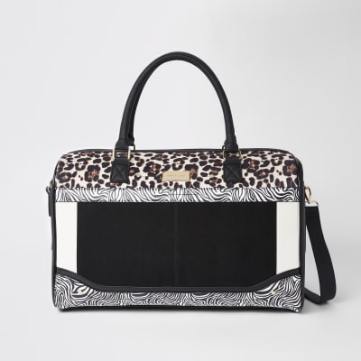 White mixed animal print weekend bag - Suitcases - Bags ...