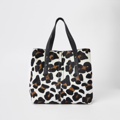 Beige leren ruime tas met luipaardprint